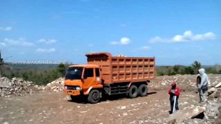 Dump Truck Mitsubishi Fuso Unloading Rocks