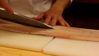 Filetting and dissecting the spine of a hamo conger eel