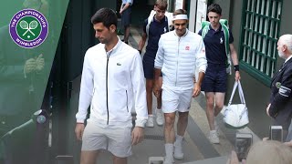 Roger Federer and Novak Djokovic walk onto Centre Court for Wimbledon 2019 Final
