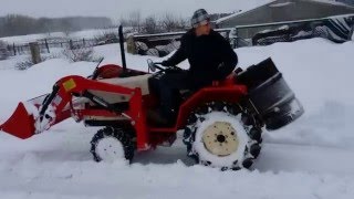 Японский минитрактор Yanmar f 16 d с погрузчиком  снежный тест