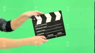 hand girl with clapperboard on the green screen