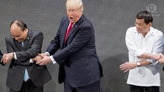 Donald Trump makes ASEAN handshake photo op go awry
