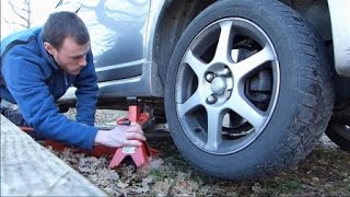 Comment lever votre voiture et démonter une roue