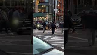 Onlookers Lift An SUV Off A Woman After A Car Accident In New York City