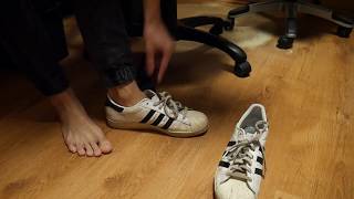 Adidas Superstar, white socks and bare feet