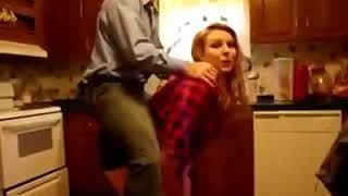 Strong girl gives a piggyback ride to a guy