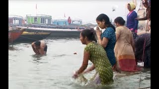 People bathing in the Ganges river HD stock video footage