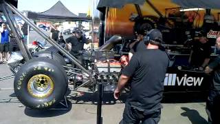 Top Fuel warm up and idle. Loud one!
