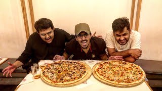 LARGEST BEEF PIZZA & CHICKEN PIZZA | Thin Crust Pizza in LAHORE PAKISTAN.