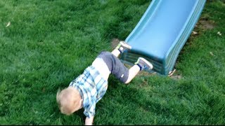 Toddler Faceplants On Slide ... Watch His Reaction!