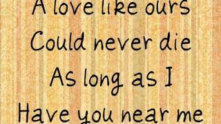 The Beatles - And I Love Her (lyrics)
