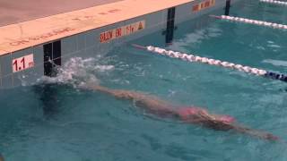eniko is practicing swimming turns