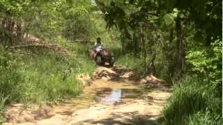Kawasaki Prairie 360 4x4 ATV Destroying deep mud hole @ HAspen Acres Indiana. Epic!