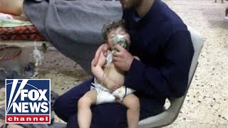 Dozens killed in suspected chemical weapons attack in Syria