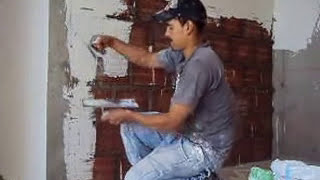 estucando  pared  sin repellarla en ladrillo  rustico en el  edificio rincon de la flora cali
