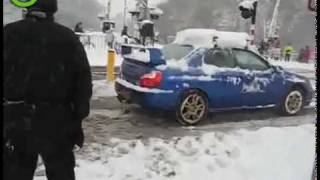 VIDEO Subaru Impreza WRX STI Pulls Truck Out Of Snow Covered Road! -