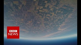Wingsuit pilot 'faster than a supercar' - BBC News
