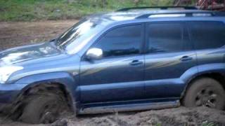 Toyota Land Cruiser Prado off road on mud