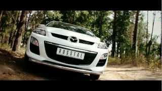 MAZDA CX-7 2010.Обвес из нержавейки.  www.russtal-group.ru