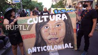 Spain: Demonstrators march in Madrid in rejection of colonialism on National Day
