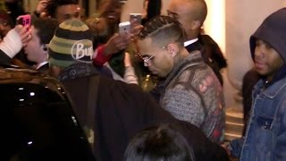 EXCLUSIVE: Crazy fans at Chris Brown hotel exit in Paris