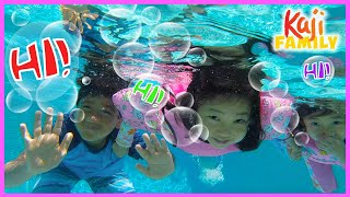 Ryan Emma and Kate swimming in the Pool