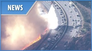 California Wildfires: choppers protect fleeing motorists