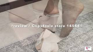Secretary with sexy Casadei wedge mules