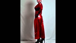 Mistress in shiny red dress. pantyhose and fetish 10in boots