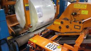 Automatic Kick Up Film Wrapper