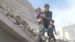 Bodycam footage shows children being rescued from rubble in eastern Ghouta, Syria