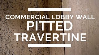 We're Filling in the holes...  Pitted Travertine Lobby Wall Makeover!