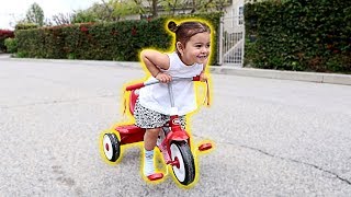 ELLE LEARNS HOW TO RIDE A BIKE!!! (WE CAN'T BELIEVE IT)