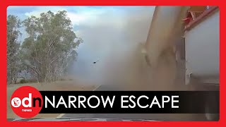 Narrow Escape! Australian Police Car Almost Gets Crushed in Crash By Two Giant Lorries