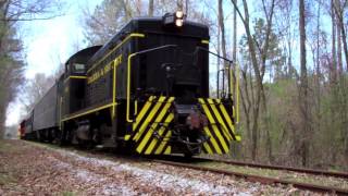 Locomotive detonating railroad torpedo signaling device