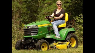 John Deere x738 Cutting Grass and Pulling Logs