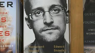 Departamento de Justicia de EEUU demanda a Snowden por su nuevo libro | AFP