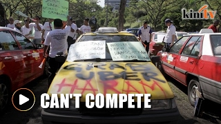 Taxi drivers told to blame ministers for Uber, Grab