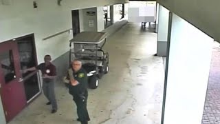 Video Shows Armed Deputy Waiting Outside School During Parkland Shooting: Cops