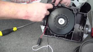 How do I replace the cord rewind on my Dyson DC20?