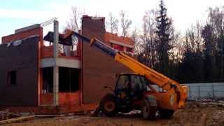 Погрузчик с телескопической стрелой