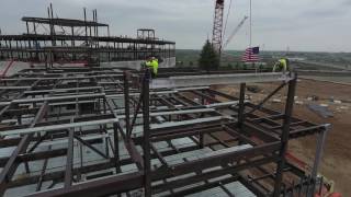 Mercyhealth Women's and Children's Hospital and Medical Center Campus raises final beam