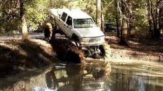 GIANT LIFTED BIG BLOCK CHEVY 4X4 on TRACTOR TIRES GOES DEEEEEEP!!