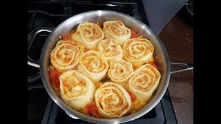 Рулетики с капустой на овощной подушке.