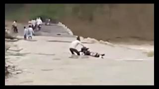 Motorbike Driver Ignores Flood in india