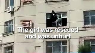 Toddler hanging outside balcony saved by sanitation worker
