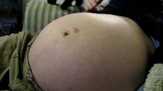 28 week old unborn baby kicking in stomach