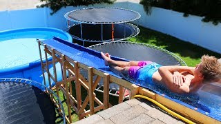 GIANT Backyard Water Slide in our Trampoline Water Park!!