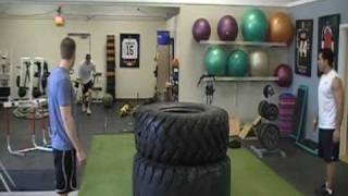 Argo Bwell jumps over 2  tires 48x60