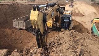 Cat 365C L Excavator Loading Trucs With 3 Passes